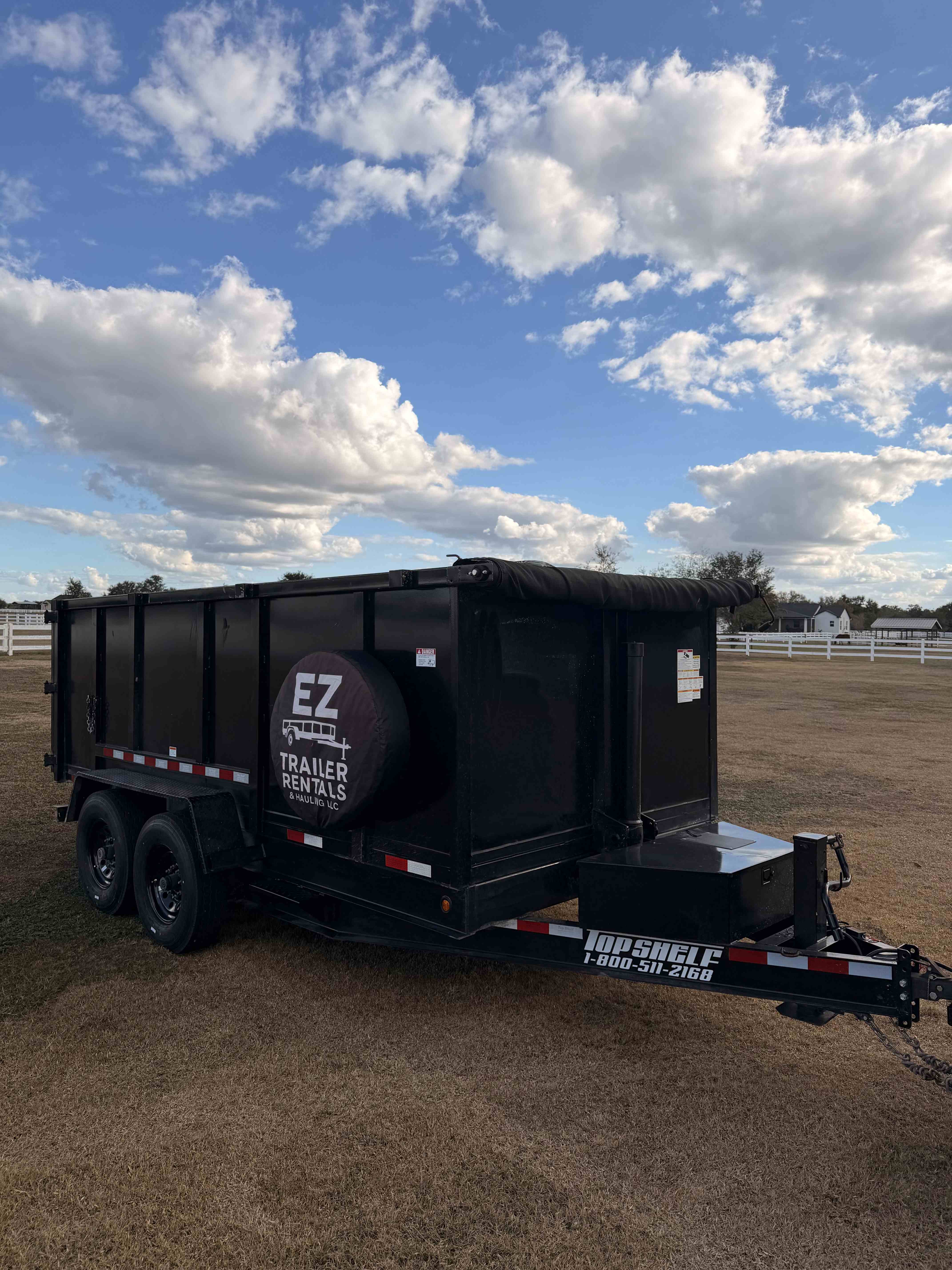 Equipment trailer for junk removal services